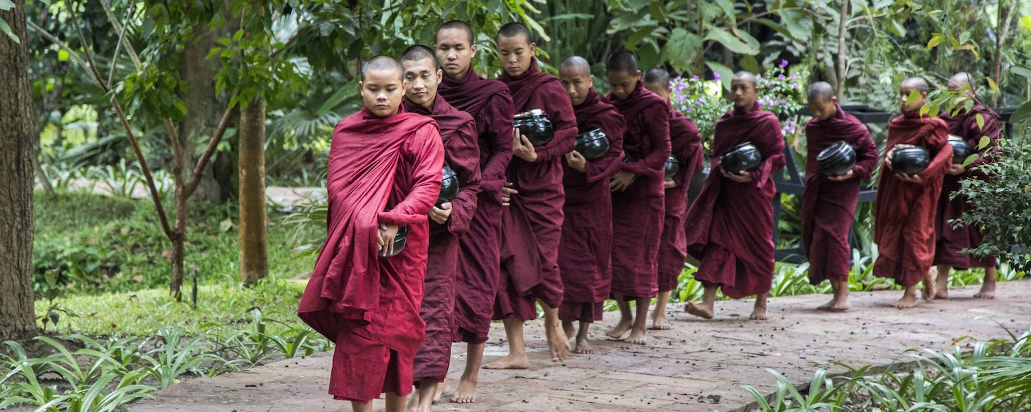 Aung Ko Ko - monks collecting alms - Inle Lake - Sampan Travel
