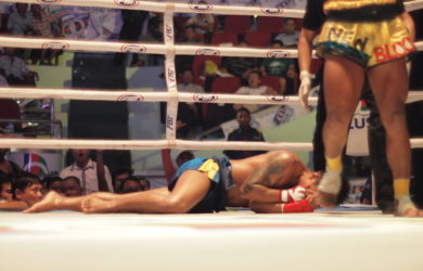 Burmese Boxing - Boxer on floor in ring - Sampan Travel