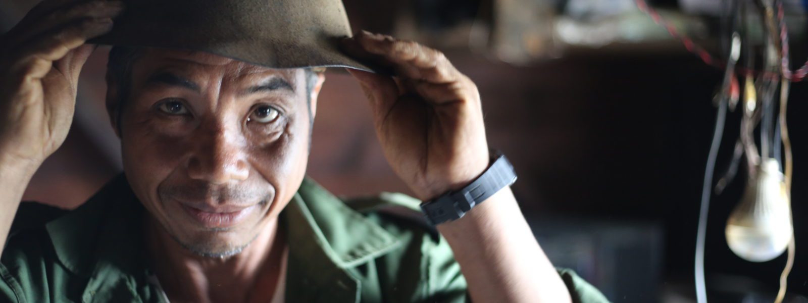 Introducing Forgotten Allies - Man in helmet - Chin State, Myanmar - Sampan Travel