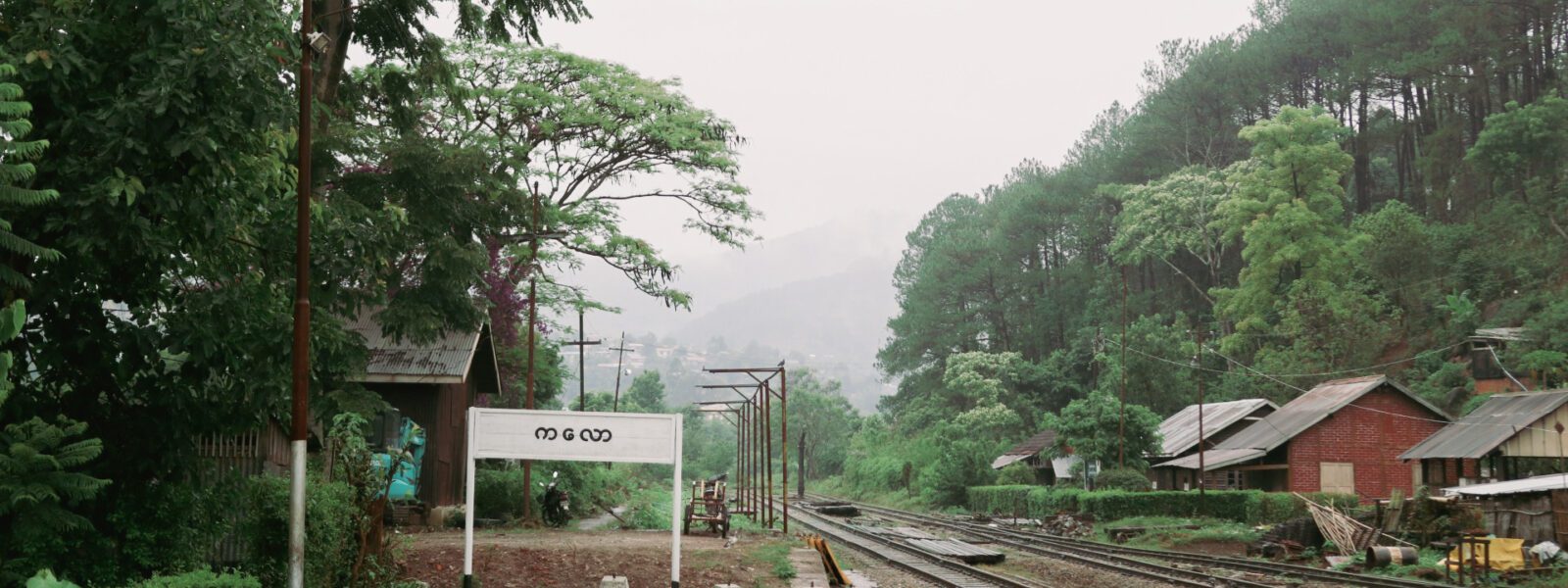 Train station at Kalaw, Myanmar; cloudy, misty sky
