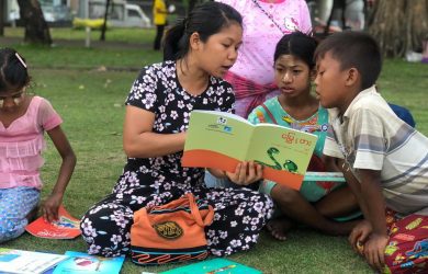 Third Story Project - Reading in the Partk - Myanmar - Sampan Travel