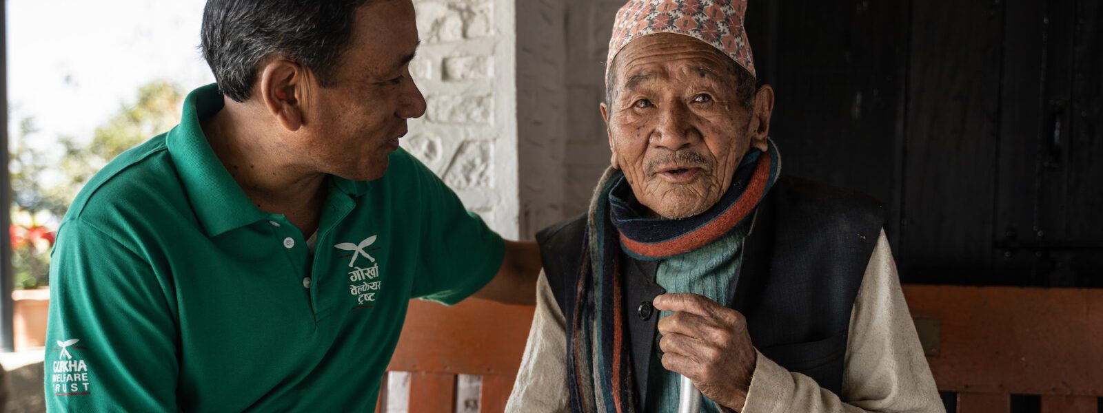 Gurkha Welfare Trust team-member and elderly Gurkha man in Diktel, Nepal. (Gurkha Welfare Trust)